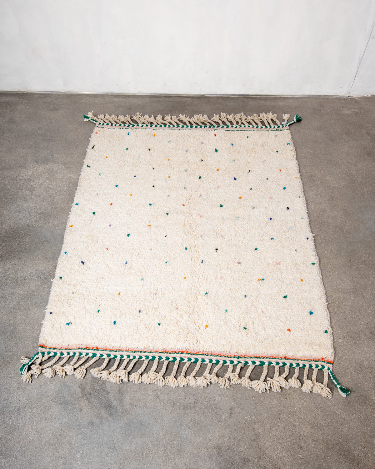 Modern, designer, handcrafted Berber rug from Morocco. Beniourain carpet with beautiful colours and patterns and fluffy wool texture.